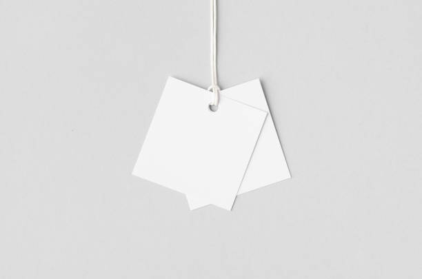 istock White square clothing tag, gift tag mockup. 1800320382