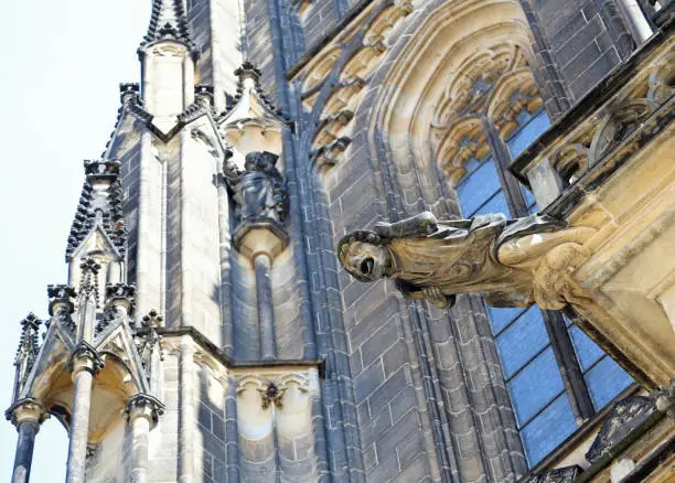 half-man half-monster gargoyle statue in a European church