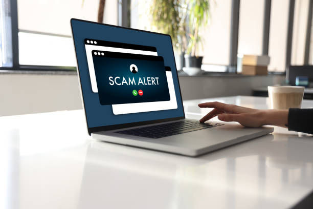 istock Ccam Alert On Laptop Screen 1800335187