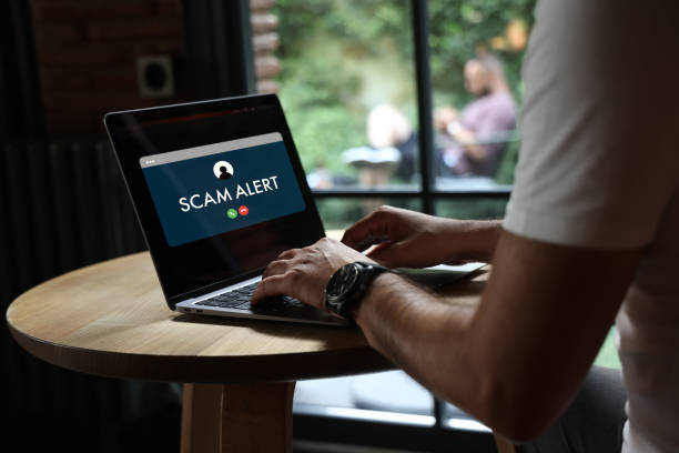 istock Ccam Alert On Laptop Screen 1800335188
