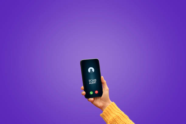 Woman holding with scam alert