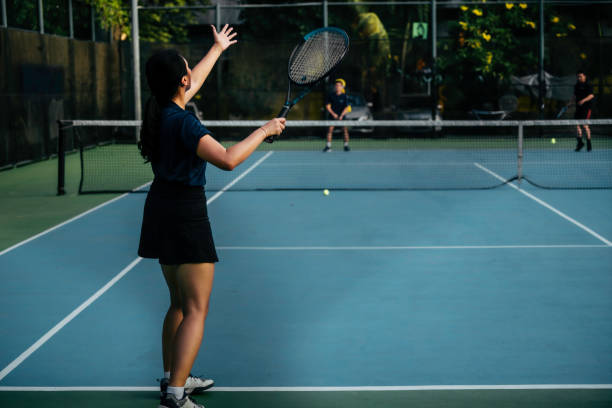 istock Women's Tennis doubles 1800345702