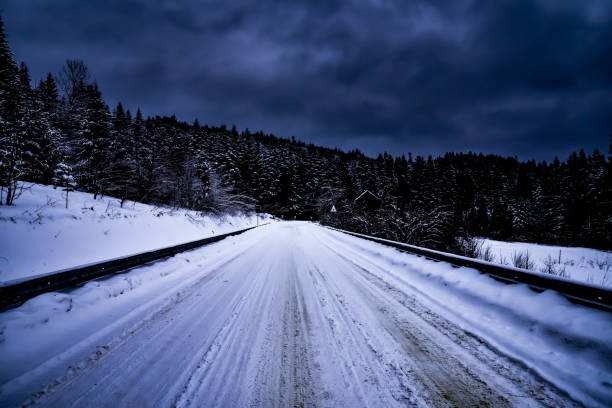 istock Road covered with snow in the Ukrainian Carpathians 1800360962