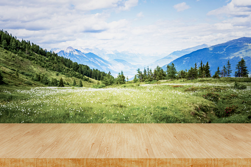 Wood desk taple top view mountain landscape product presentation template stock photo blurry background 3d rendering.