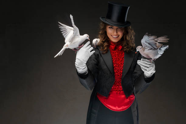istock Enchanting magician with white doves 1800444944