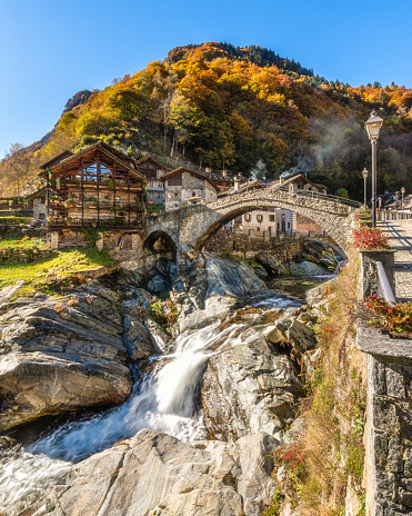 The beautiful village of Rassa, during fall season, in Valsesia (Sesia Valley). Province of Vercelli, Piedmont, Italy.