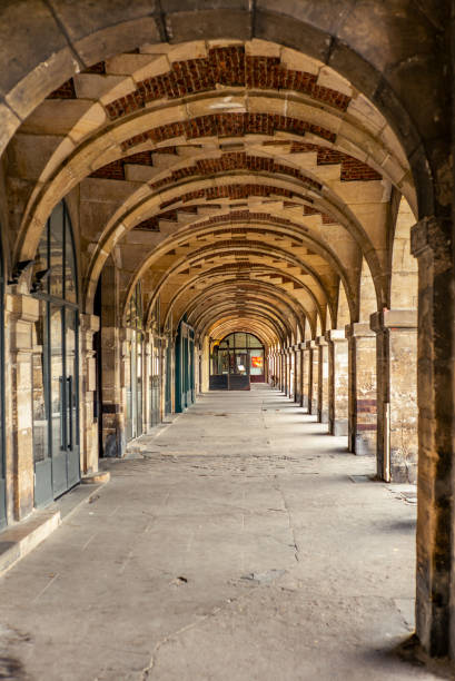 istock The arcade in the Place des Vosges in Paris 1800457782