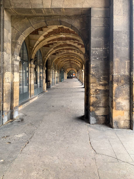 istock The arcade in the Place des Vosges in Paris 1800457786