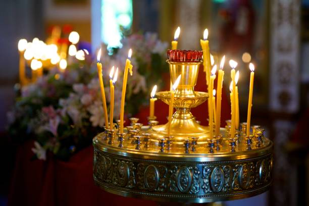 istock Candles of yellow wax 1800461778