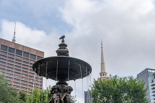 Brewer Fountain in Boston Common.  Brewer Fountain by Michel Joseph Napoléon Liénard, is a 1868 bronze sculpture. It is on the corner of Park and Tremont Streets in Boston, Massachusetts.