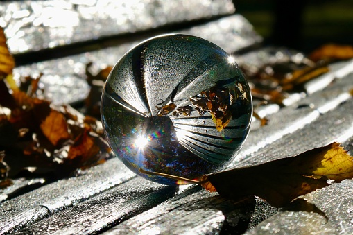 Crystal ball on wooden bench