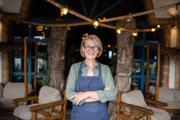 istock Mature woman cafe owner 1800568629