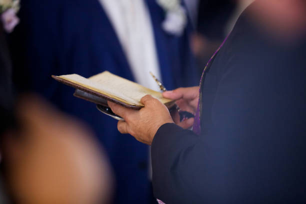 istock The Christian priest holding a Bible 1800572308
