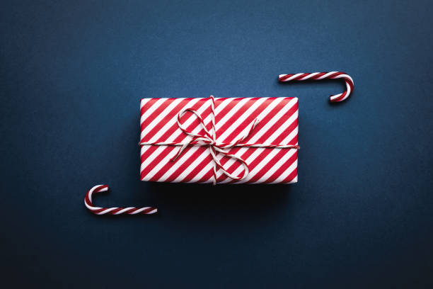 istock Christmas gift on color background, flat lay 1800578161