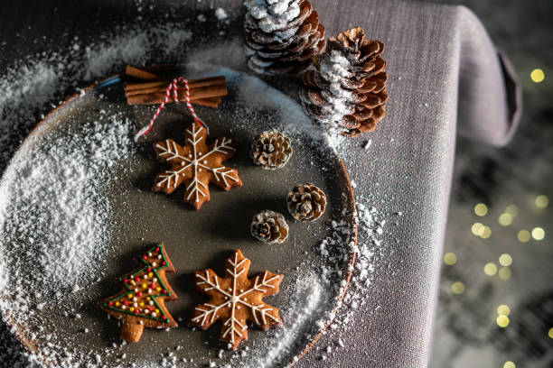 chinnamon cookies and cones are in dish on table horizontal christmas background still