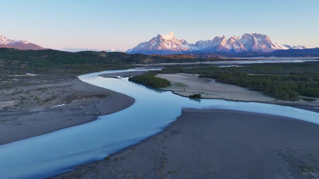 Serrano River with view to Cerro Torre, Torres del Paine, Chile. River Valley Serrano. The smooth curves of the river