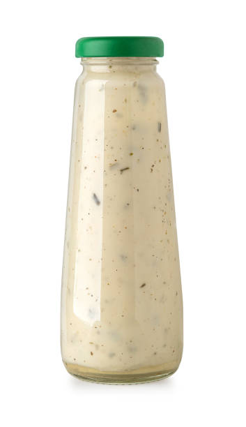 istock Glass bottle of white sauce. 1800613211