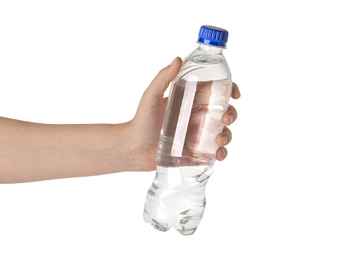 Young woman hand holding water bottle isolated on white background.