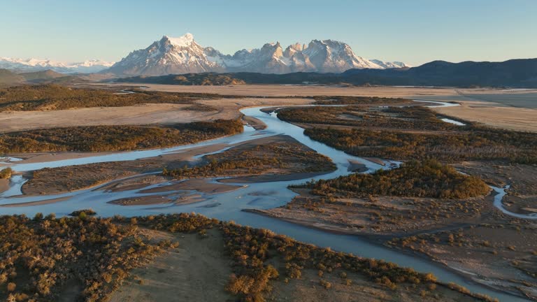 Serrano River with view to Cerro Torre, Torres del Paine, Chile. River Valley Serrano. The smooth curves of the river