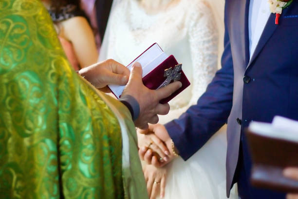 istock The Christian priest holding a Bible 1800618238