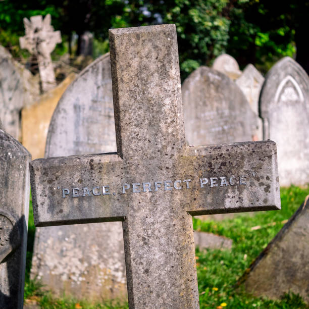 istock 'Peace, Perfect Peace' gravestone cross 1800652595