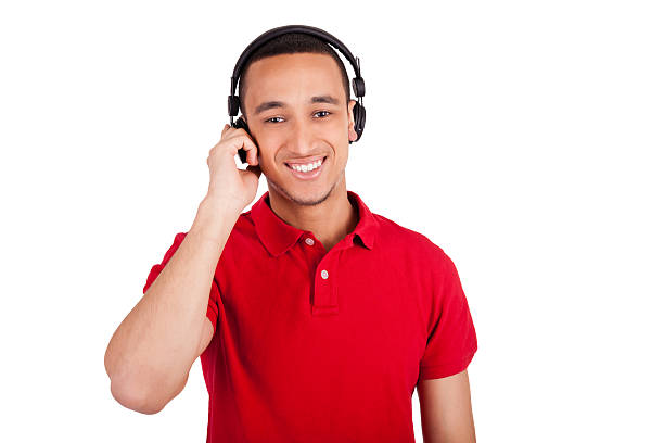 istock Black man having fun listening to music 180065272