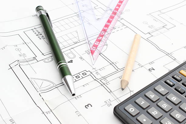 istock Drawing accesories and calculator on housing plan 180066711