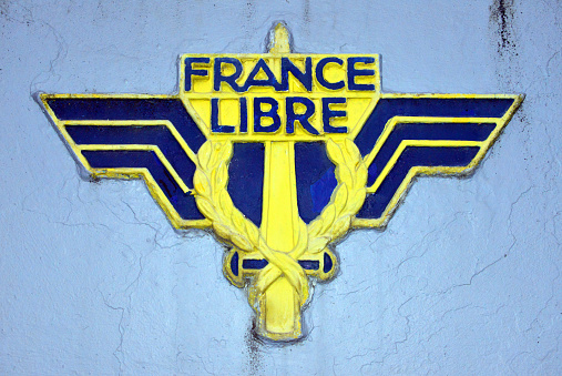 Pointe-à-Pitre, Grande-Terre, Guadeloupe: Free France ('France Libre') symbol - Free French Forces - detail of the monument erected in memory of the Guadeloupean resistance fighters who died during World War II fighting the Vichy regime - located on Camille Desmoulins Square, Massabielle / Paul Valentino Street. Free France was the French government in exile, following the dissolution of the 3rd Republic. Led by general Charles de Gaulle, Free France was established in London in June 1940 after the Fall of France during World War II and fought the Axis as an Allied nation with its Free French Forces (Forces françaises libres).