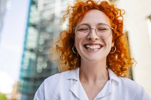 istock Smiling Redhead Professional Spreading Positivity 1800680012