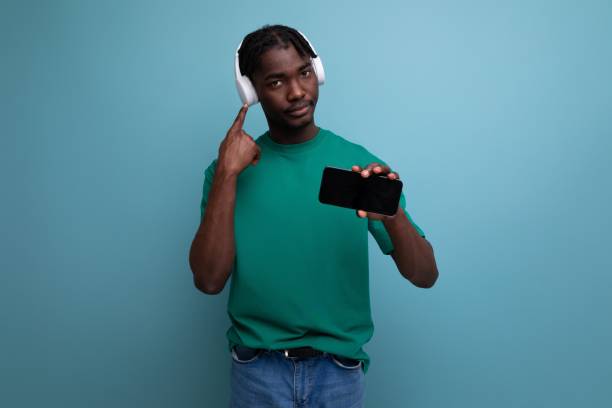 istock american man with wireless headphones and smartphone mockup 1800683479