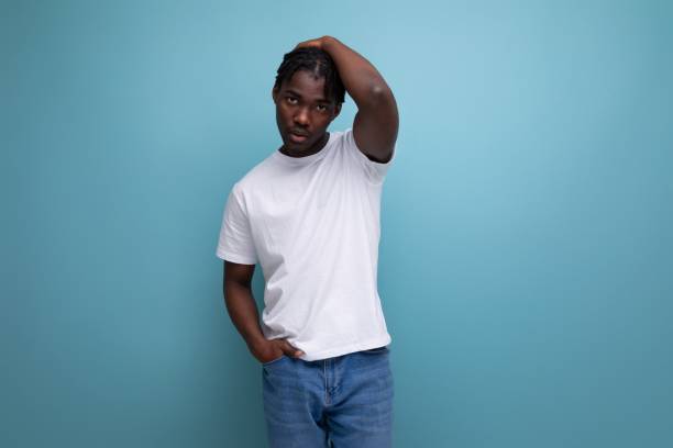 istock stylish young man with dreadlocks in a white t-shirt with empty space for logo 1800683505