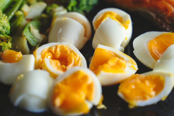 Slice of egg yolks with salad