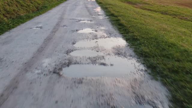 Dirt road with potholes
