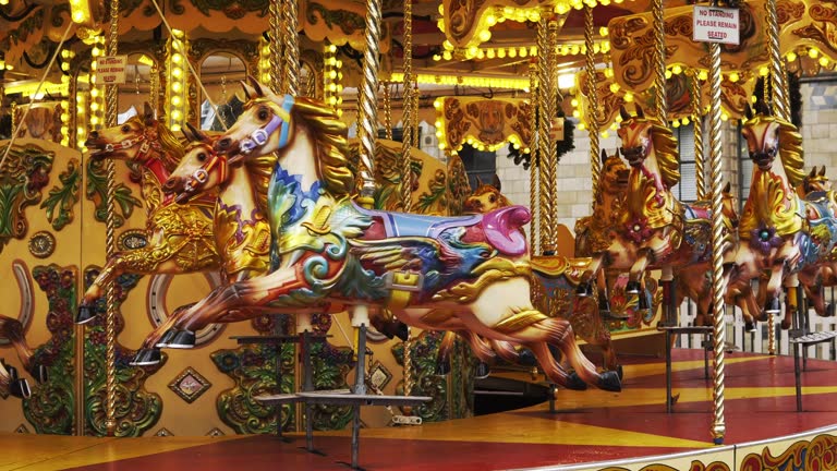 Carousel horses golden lights blurry background