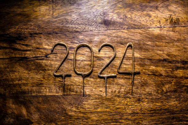 istock Number 2024 on wooden background 1800722961