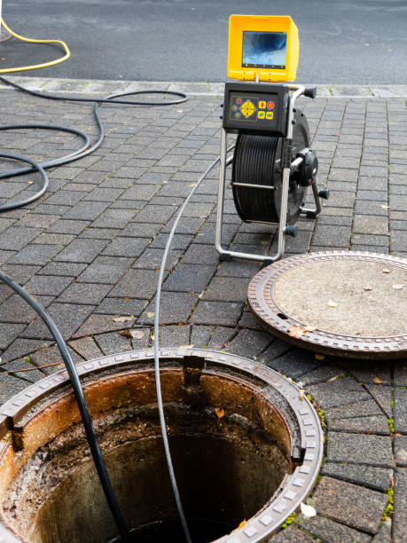 istock A drain cleaning company checks a blocked drain with a camera before flushing it out 1800730410
