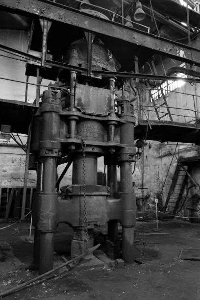 istock Old forging press in an abandoned shipbuilding factory. 1800744703