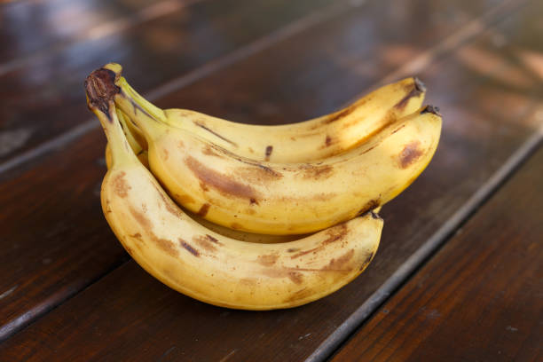 istock Bunch of bananas on the table 1800798956
