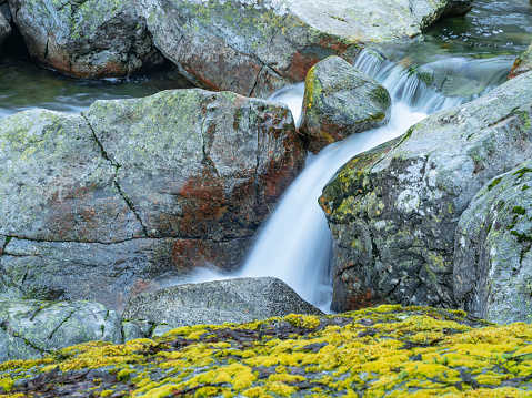 Waterfall in a mountain stream with long exposure