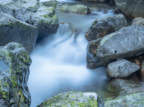 Waterfall in a mountain stream with long exposure