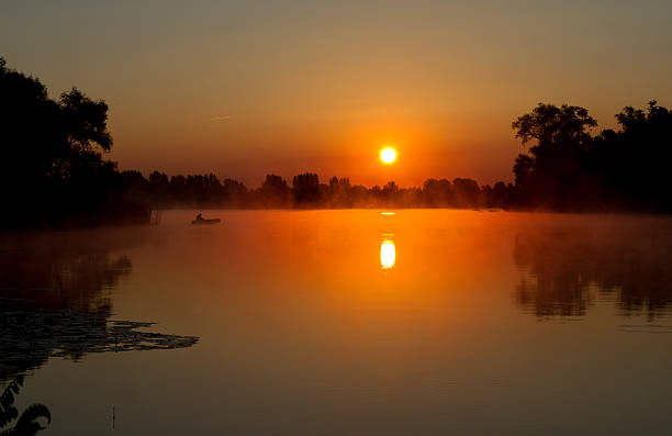 istock sunrise on the lake 180080128