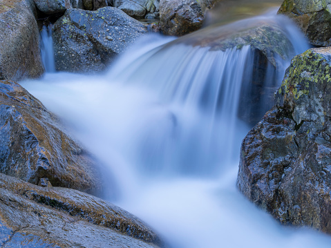 Waterfall in a mountain stream with long exposure