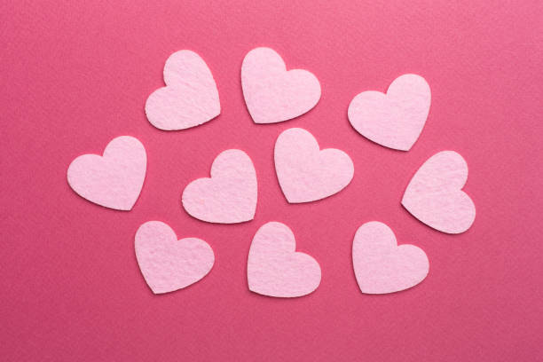 istock Felt hearts on color background, top view 1800809453