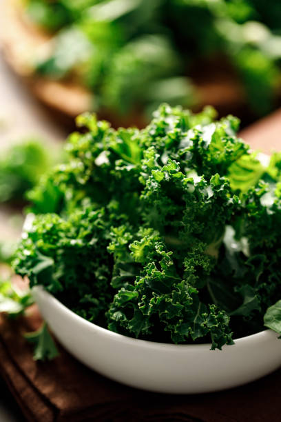 istock Kale cabbage green leaves close-up 1800812527