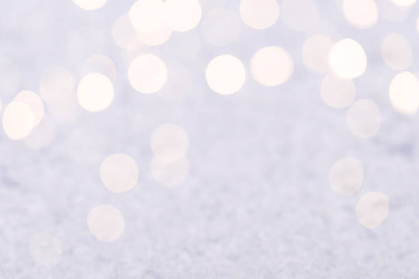 Christmas winter background with snow and flares, copy space