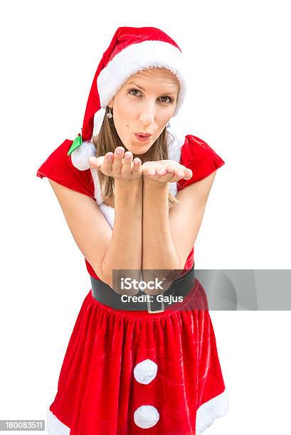 Mujer En Vestido De Navidad Enviar Un Beso En Que Foto de stock y más banco de imágenes de Adulto - Adulto, Adulto joven, Alegre