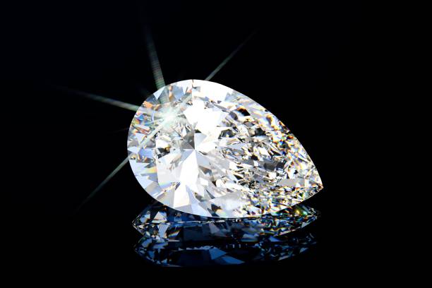 istock Closeup view of pear cut diamond on black glossy background 1800858318
