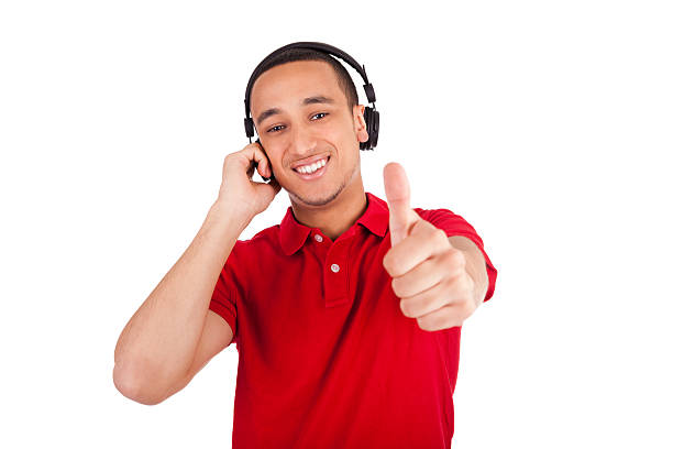 istock Black man having fun listening to music 180085873