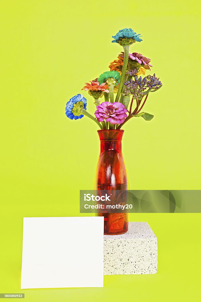 Wild Flower Bouquet A vase of colorful wild flowers against a colorful solid background. Boutonniere Stock Photo