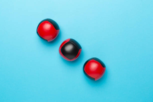 istock Colorful juggling ball on color background, top view 1800865175